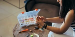 Human trafficking survivor Patty creates jewelry